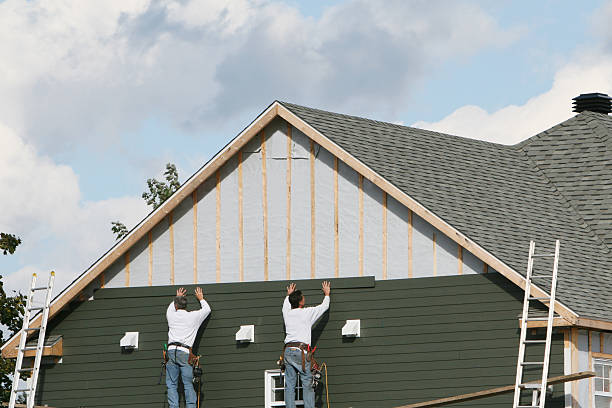 Professional Siding Contractor technician working in Piney Point, MD
